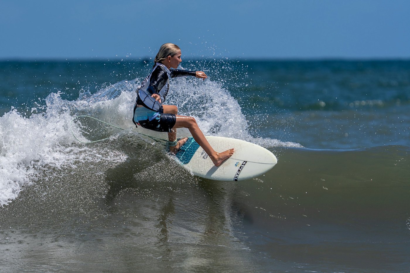 Emerson Clark off the lip on a First Coast wave
